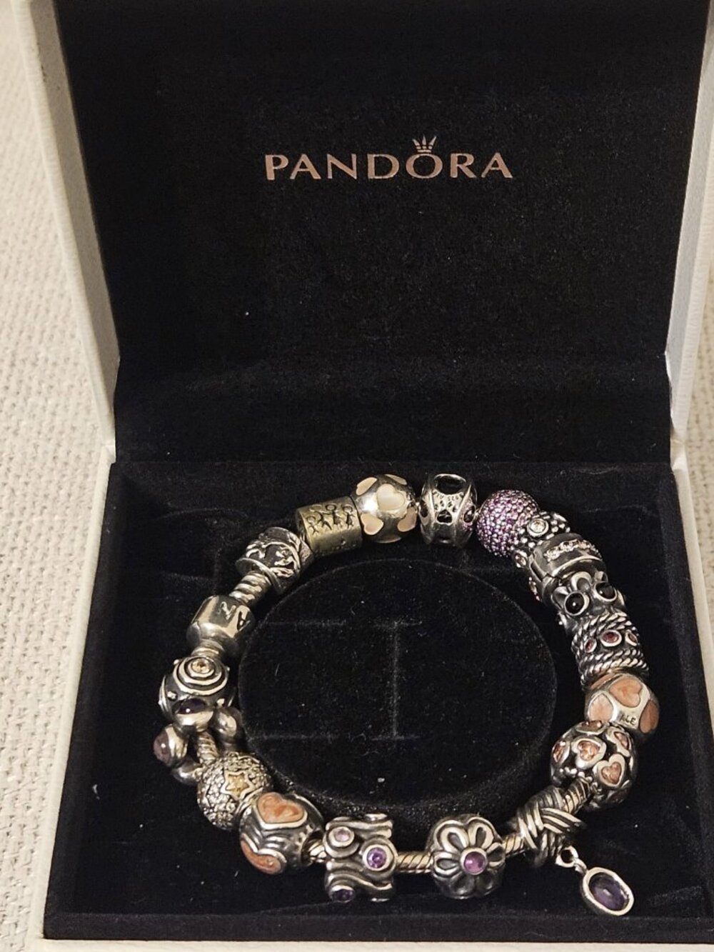 All Authentic Purple and pink Pandora Bracelet, 7 1/2 inches.